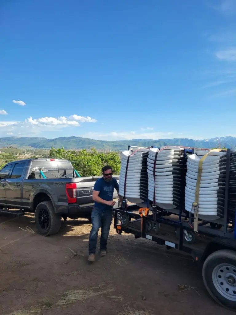Heber Valley Events chair delivery with truck and open trailer